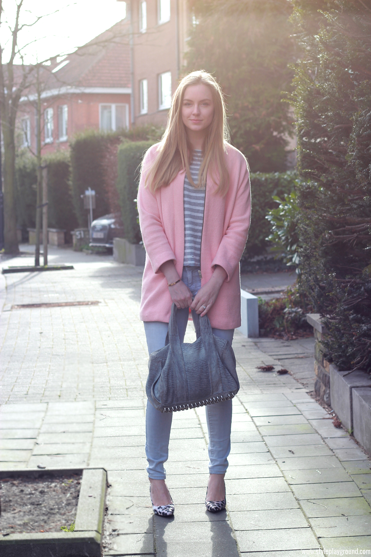 Axelle Blanpain of Style playground is wearing a Zara coat, J Crew top, American Eagle jeans, Alexander Wang bag & Whistles pumps.