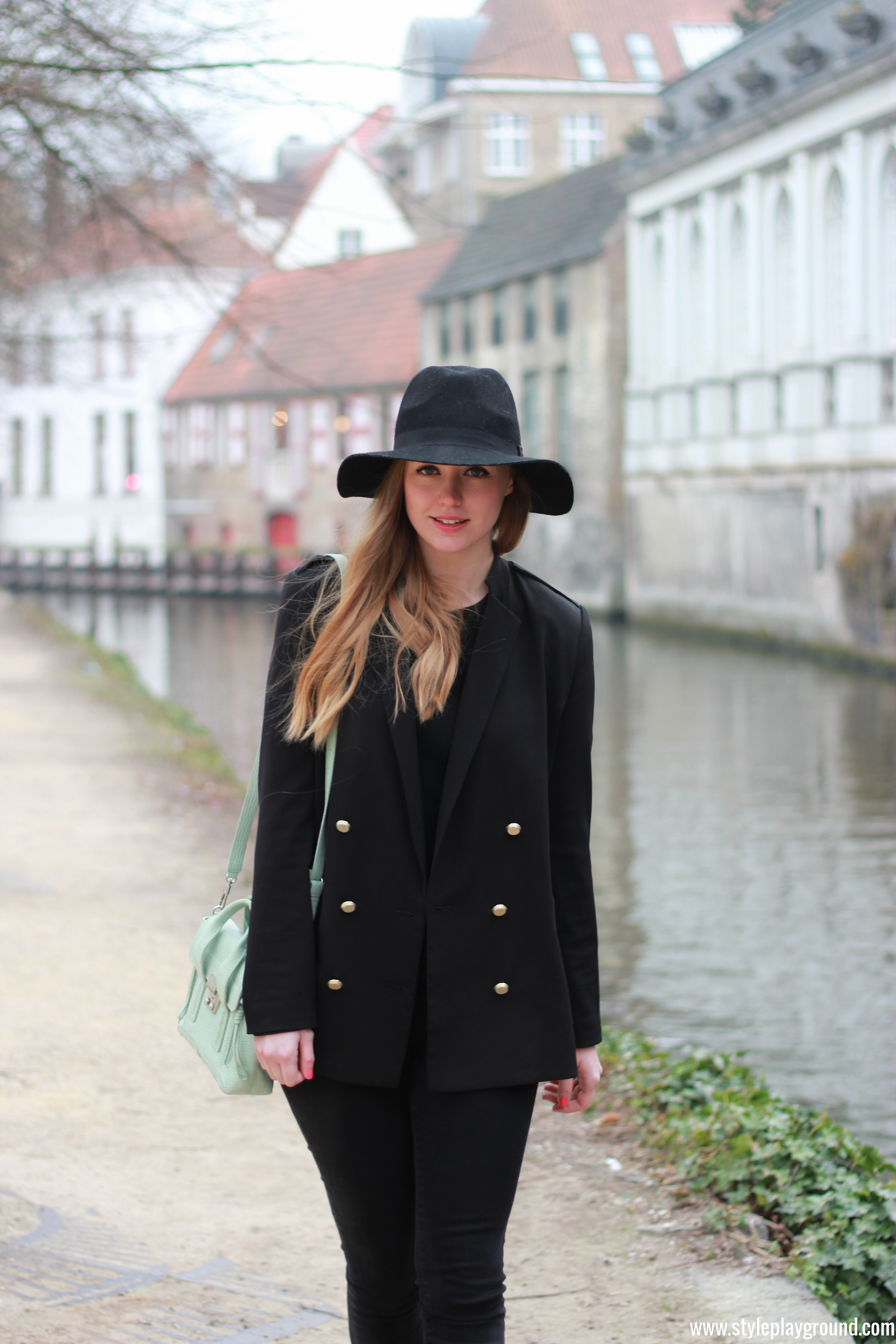 Axelle Blanpain of Style playground is wearing an H&M blazer & hat, Mango jumper, J Brand jeans, Repetto loafers & 3.1 Phillip Lim bag