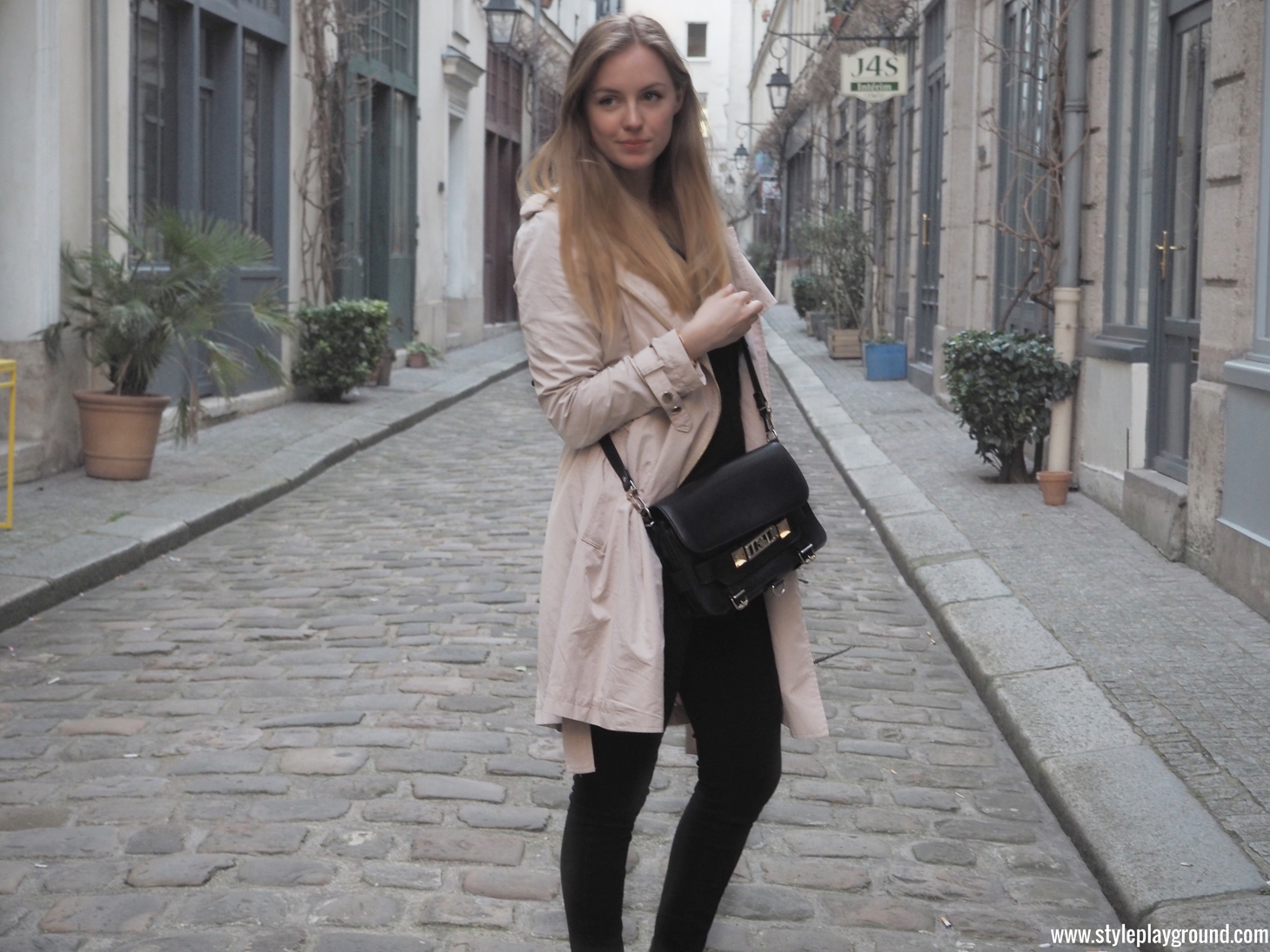 Axelle Blanpain of Style playground is wearing a Mango trench, J Brand skinny jeans, Repetto loafers & Proenza Schouler bag. 