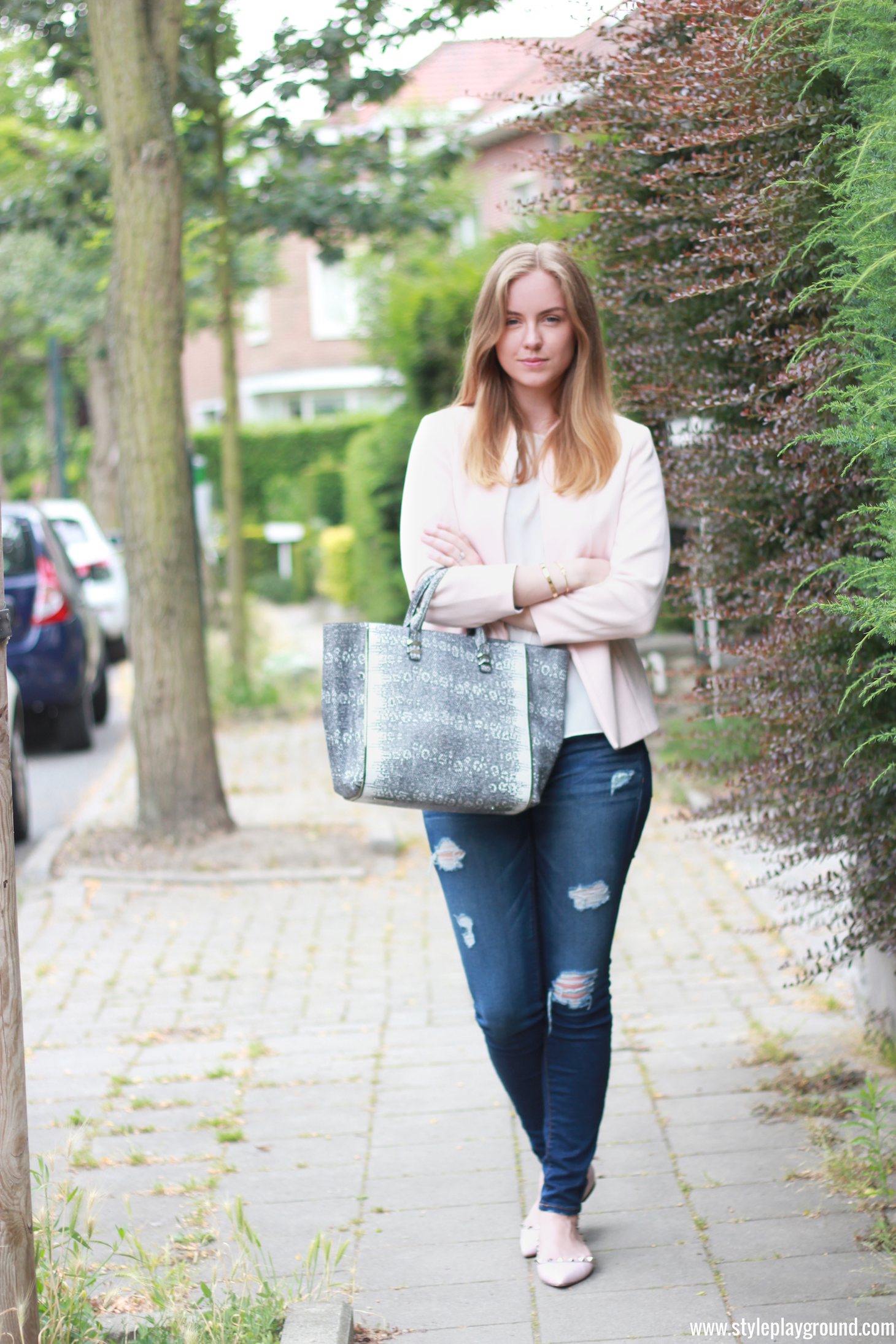 Axelle Blanpain from Style playground is wearing American Eagle ripped jeans, H&M blazer, Zara top, Rebecca Minkoff mini Perry tote & Valentino rockstud flats
